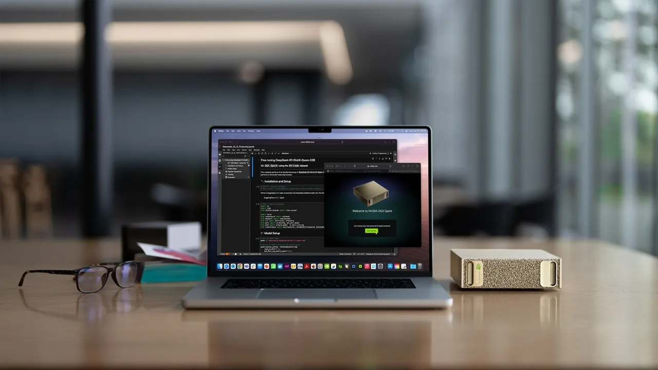 A Spark-class appliance on a desk beside a laptop